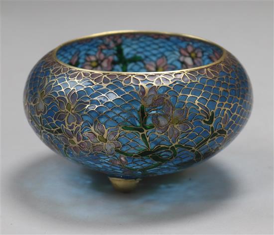 A plique à jour enamel bowl